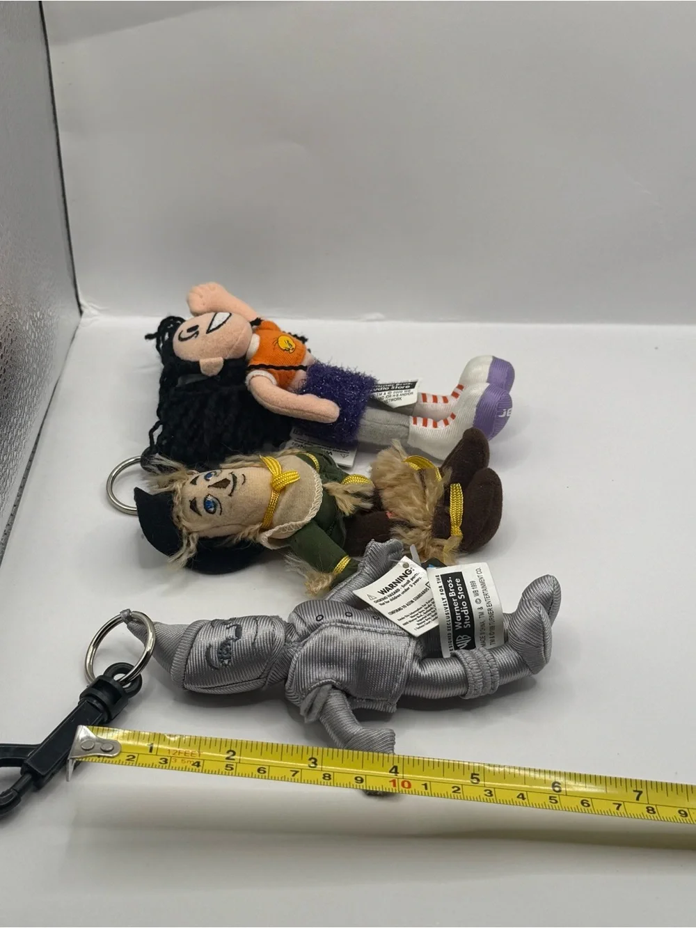 Vintage Warner Bros Keychains Lot Wizard of Oz Tin Man and Scarecrow and WB Girl